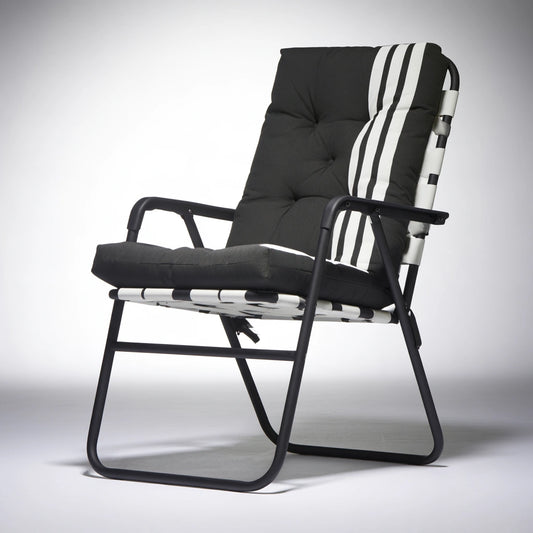 Jastira black and white folding recliner chair, modern living room armchair for relaxation and comfort.